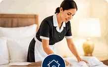 Housemaid making a bed